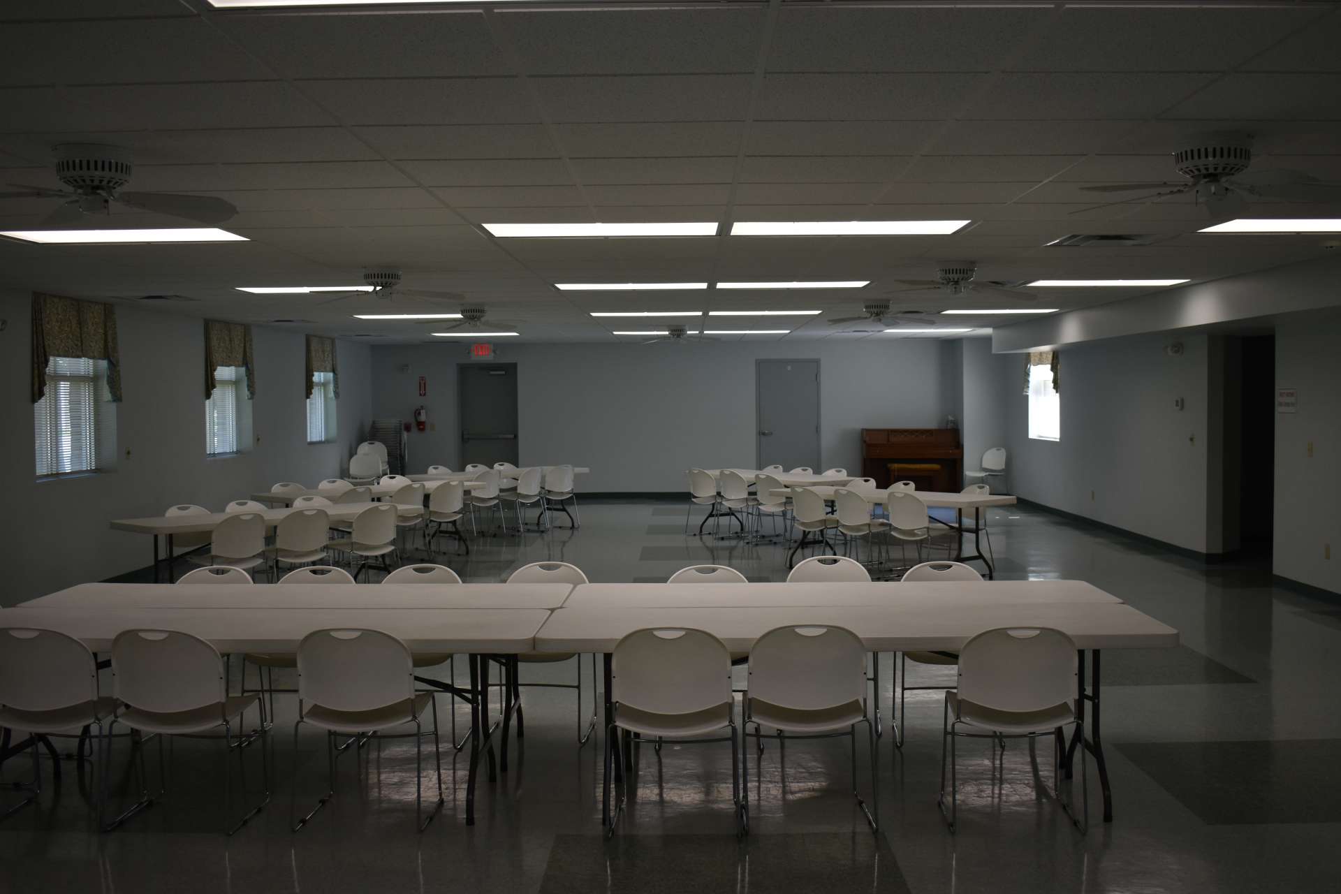 Fellowship hall set with tables and chairs