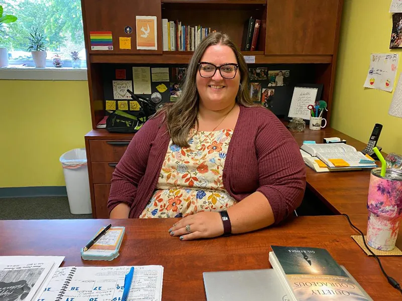 Reverend Katie Peterson-Madden at her desk